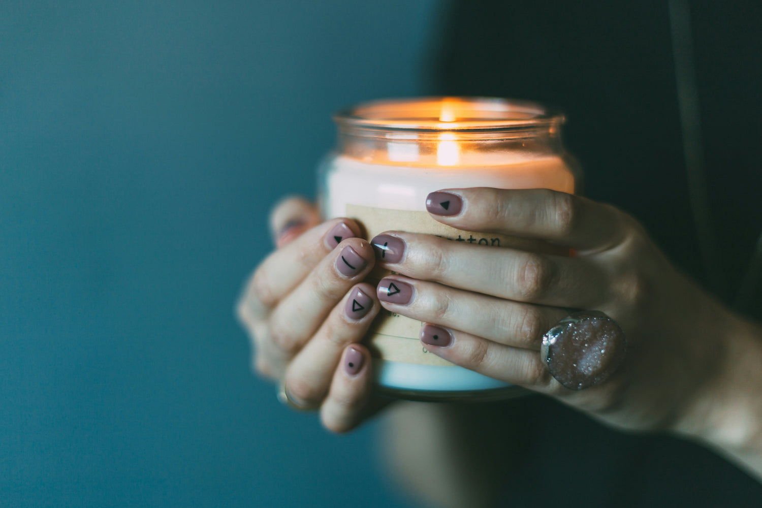 Candle warmer lamp with a sleek design, gently melting a scented candle to release fragrance without an open flame.