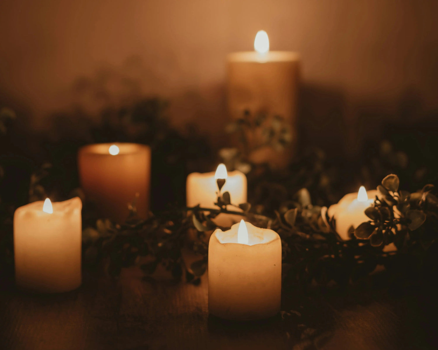 Elegant scented candles and candle warmers creating a warm, cozy ambiance with soft flickering flames and soothing fragrances – perfect for home relaxation